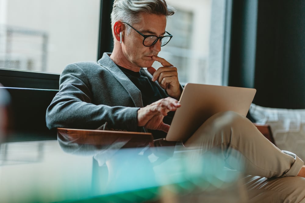 man-reading-carefully-how-to-write-a-cover-letter