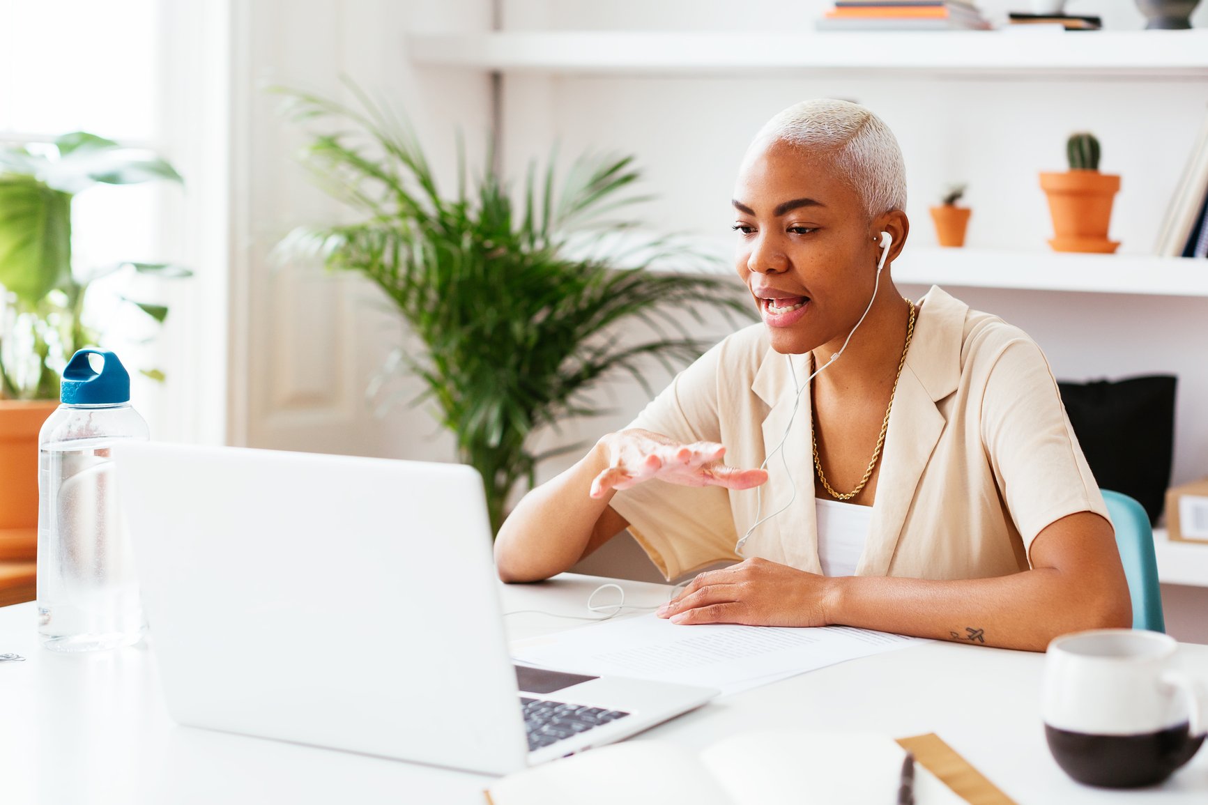 woman on conference call - how to become a great leader