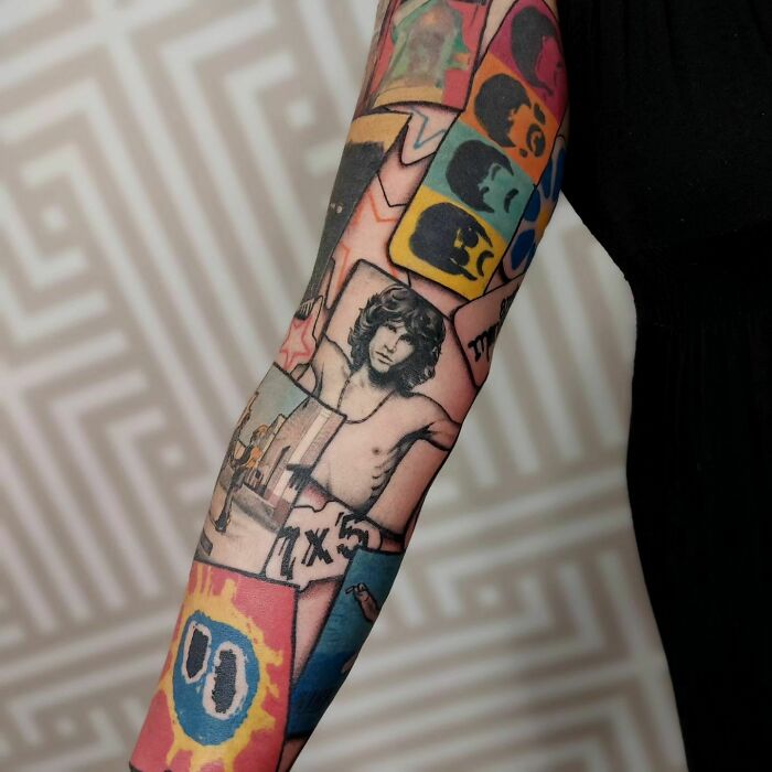 Colorful sleeve featuring music tattoos with iconic rock and pop designs.