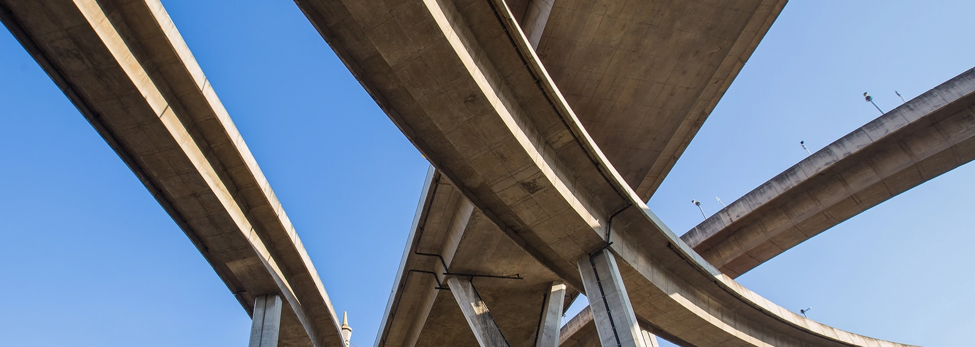 Bracewell Public Finance practice banner image, which shows bridges under a blue sky.