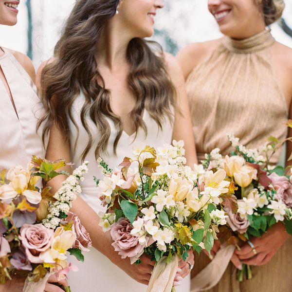 Bride and bridesmaids holding bouquets