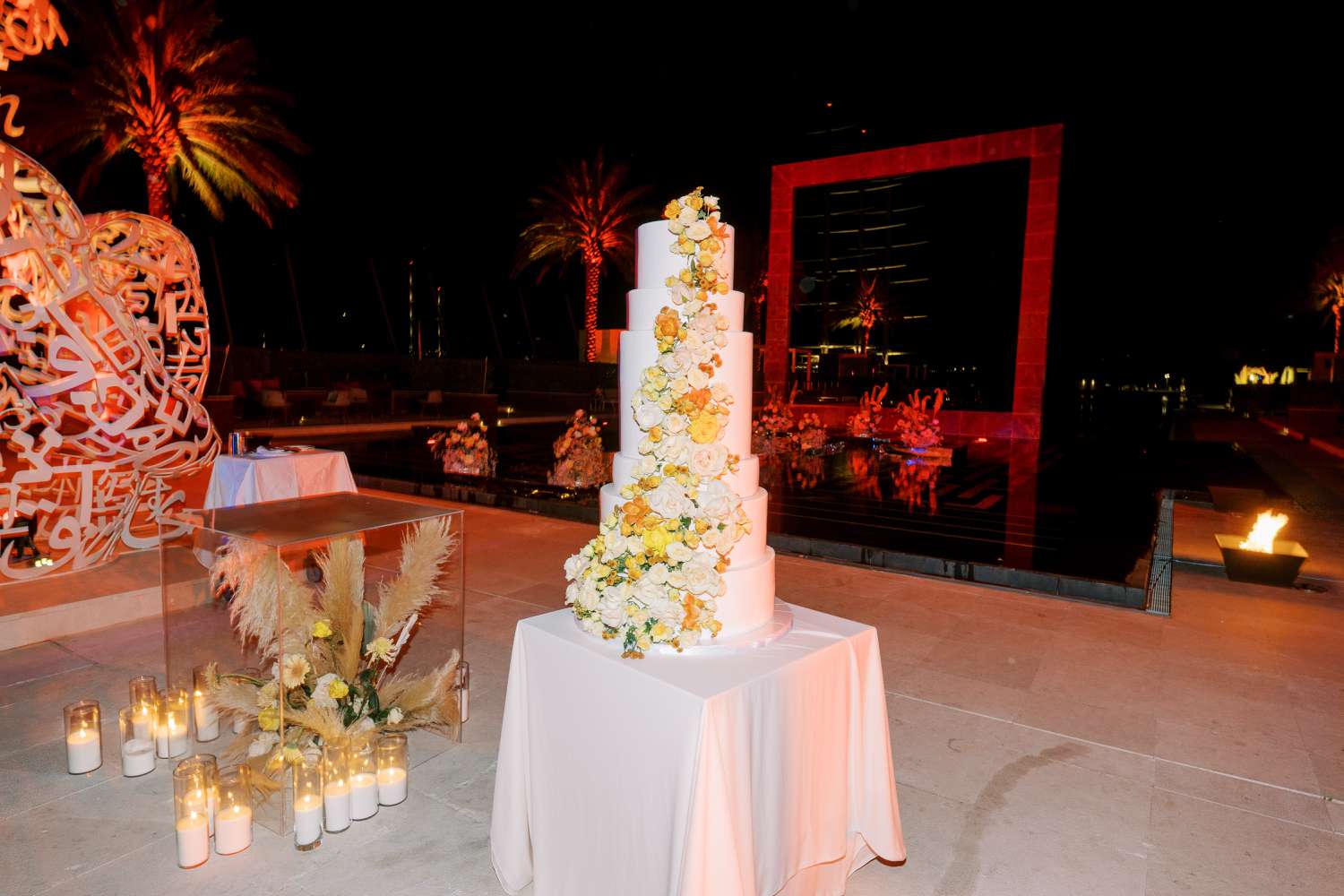 wedding cake with orange florals