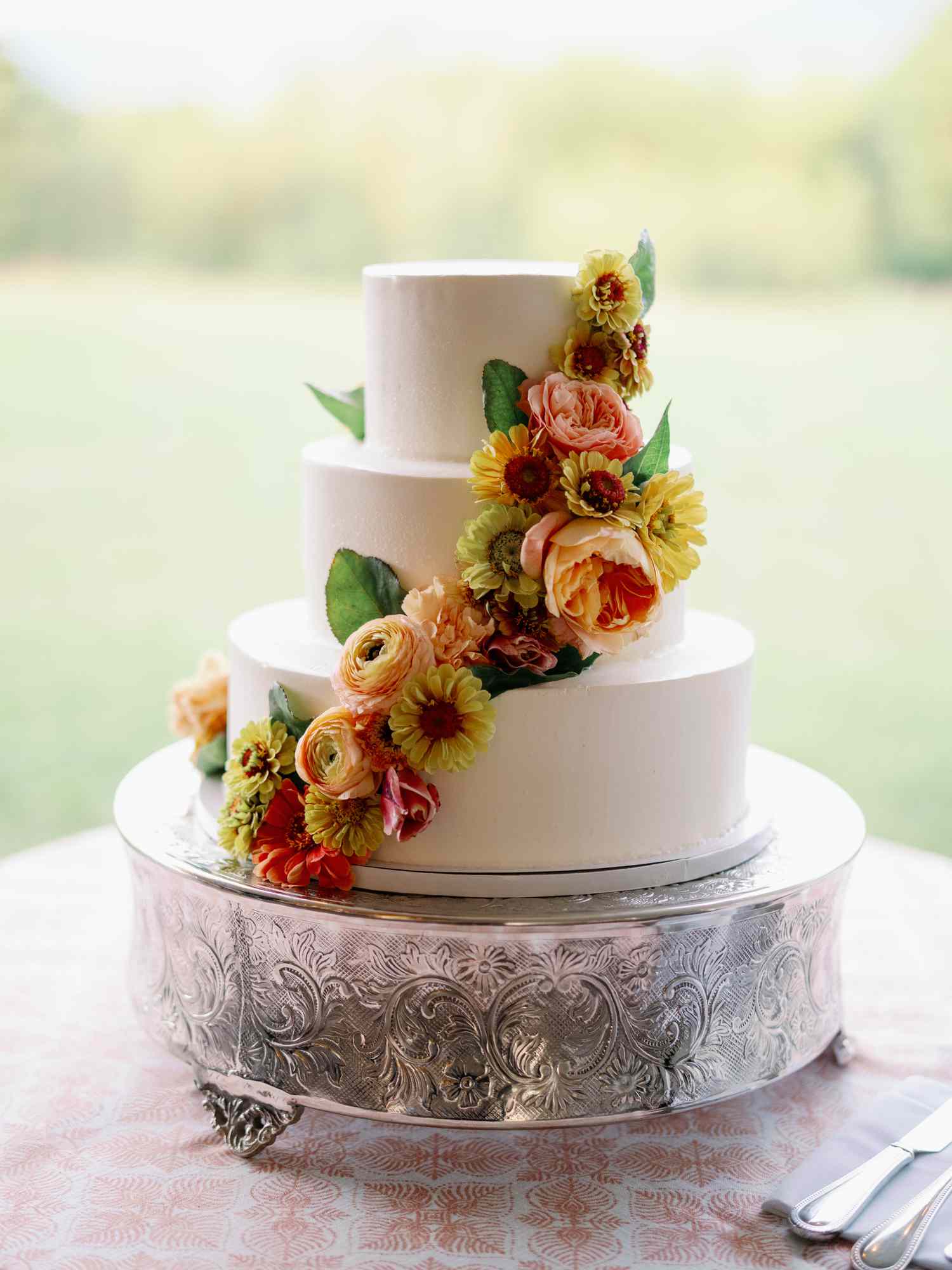 3 Tier Wedding Cake With Colorful Flower Decor 