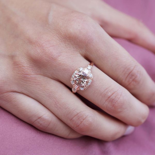 Morganite engagement ring on female hand