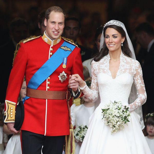 Prince William and Kate Middleton Holding Hands in Wedding Attire