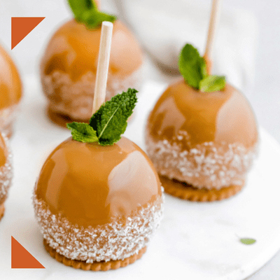 caramel apples at wedding reception with sugar coating