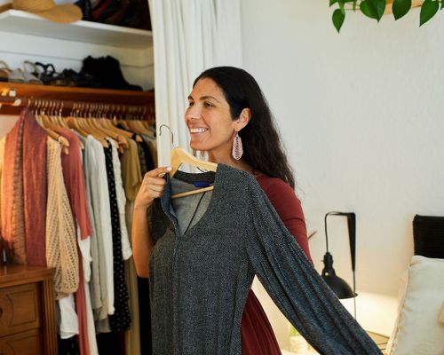 woman trying on clothes