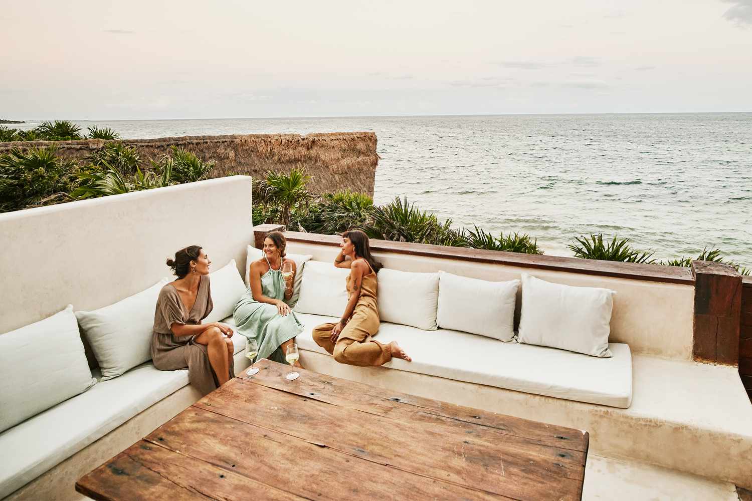 Women in Lounge by Water