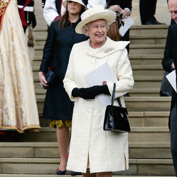 Queen Elizabeth Dressed in White Coat and Hat on Steps