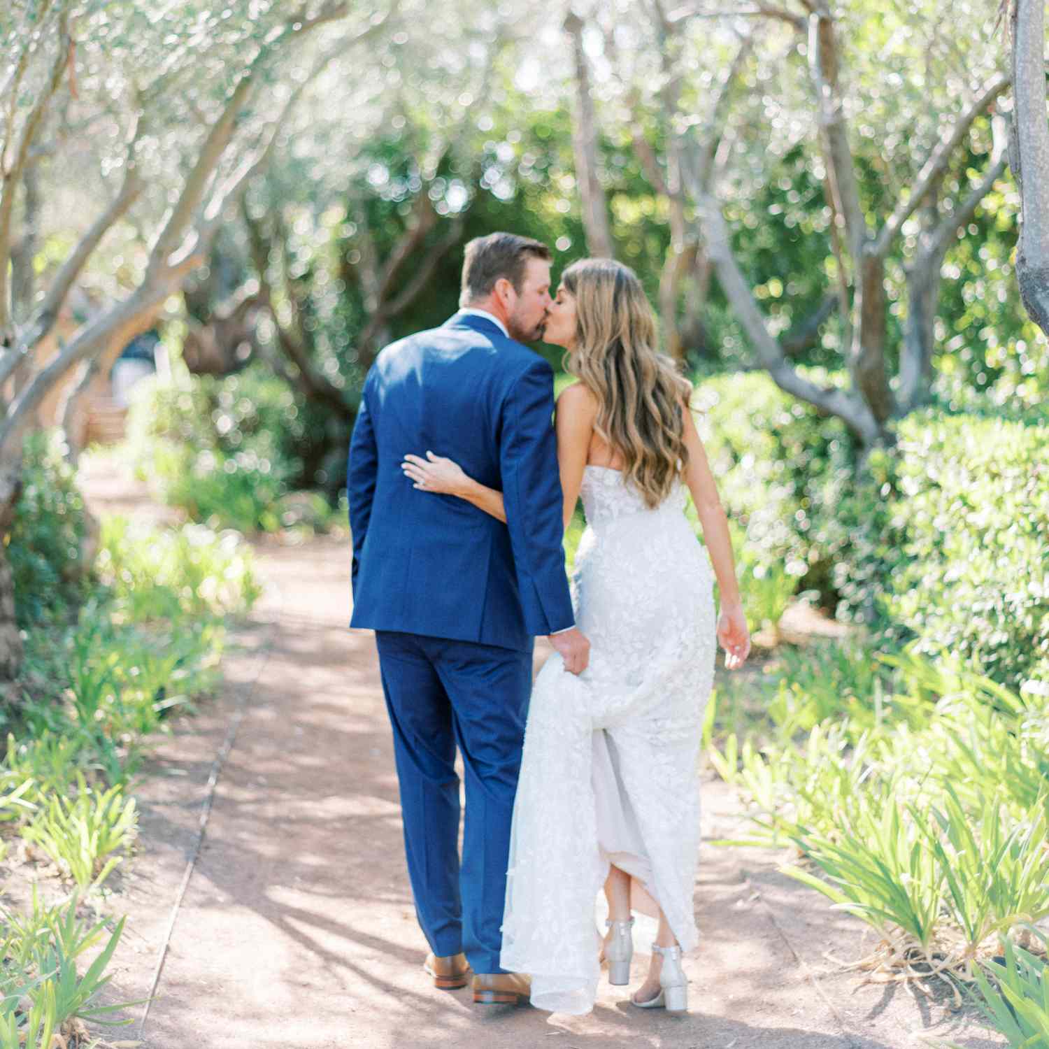 Brannan and Brian kiss at San Diego wedding