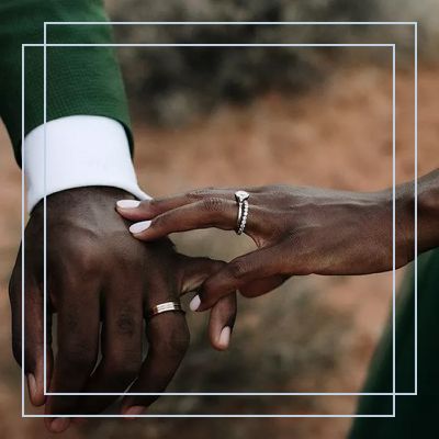 hands with engagement ring