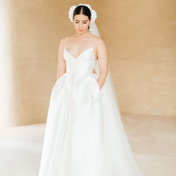 bridal portrait with bride wearing a wedding dress with pockets