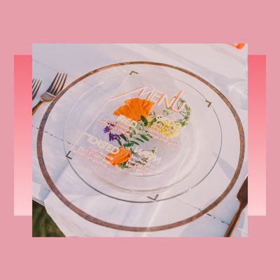 Multi-colored wedding menu on a plate