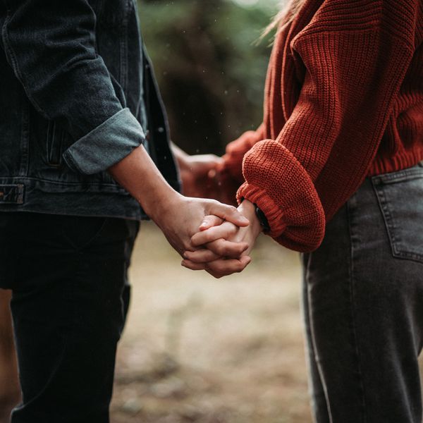 Man and Woman couple holding hands