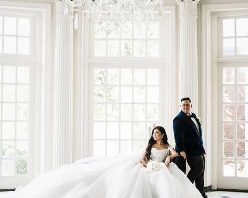 Portrait of Wedding Couple in Mansion