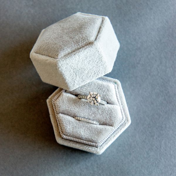 diamond engagement ring and wedding band in ring box