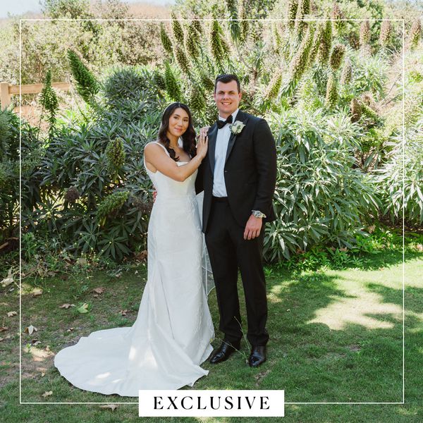 Kyla Ross in White Wedding Dres With Veil Posing With Justin Rittman in Black Tuxedo