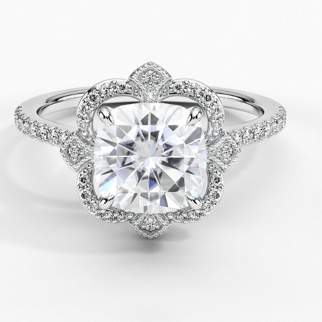 moissanite engagement ring with a halo of diamond accent