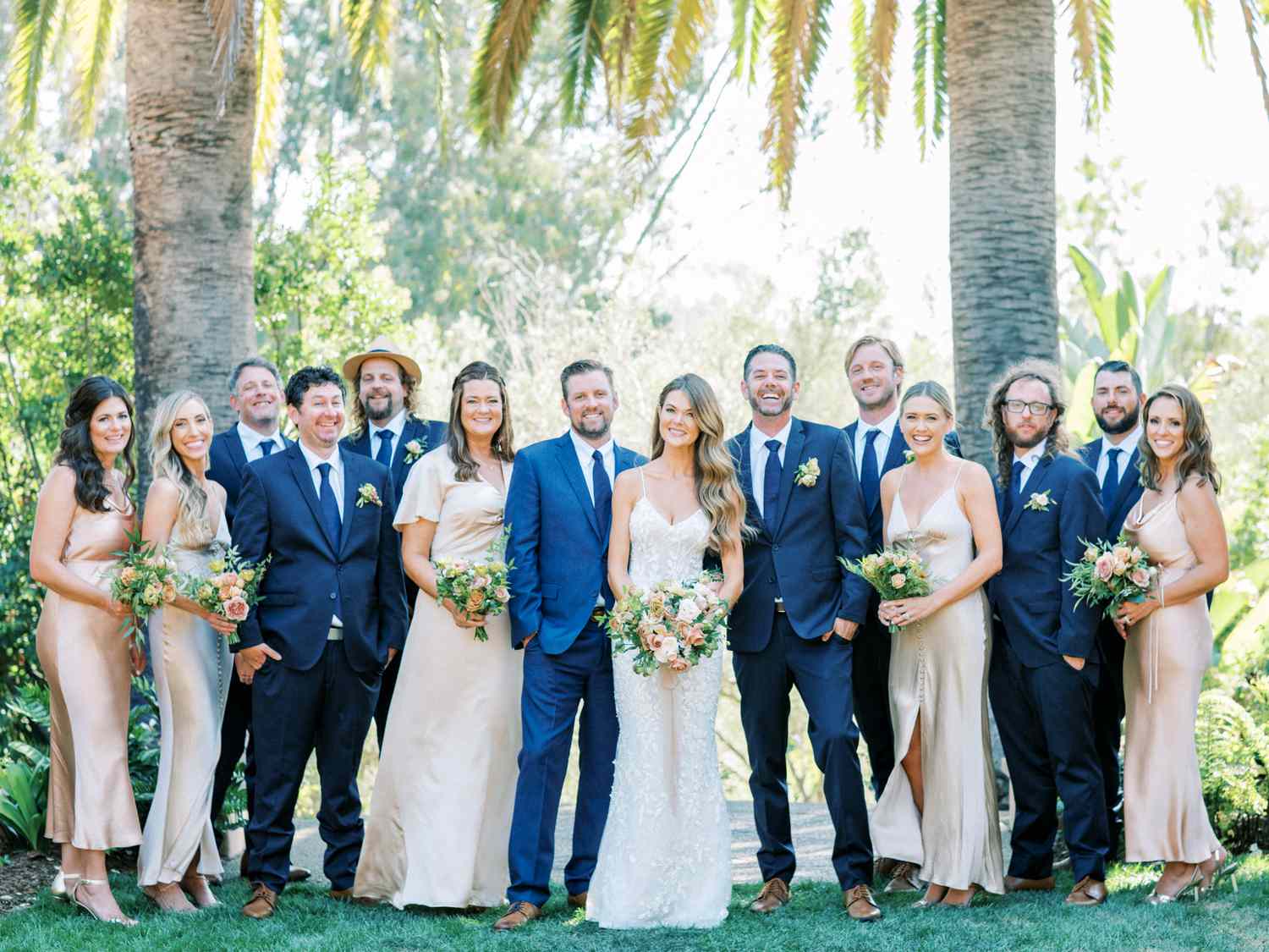 bride and groom with wedding party