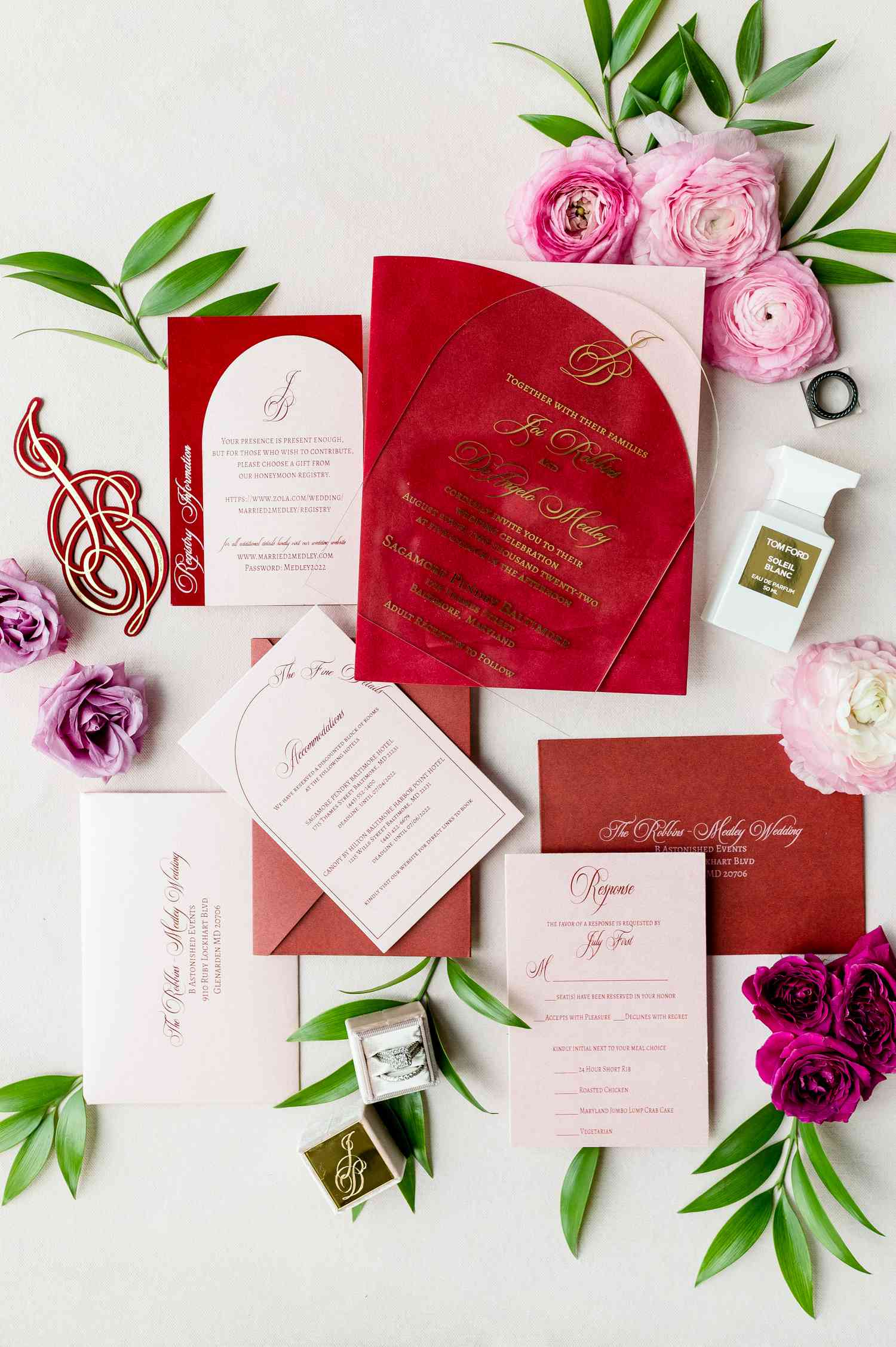 Joi and DeAngelo's red invitations