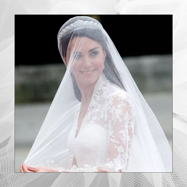 Kate Middleton on her wedding day, wearing a tiara and a blusher wedding veil