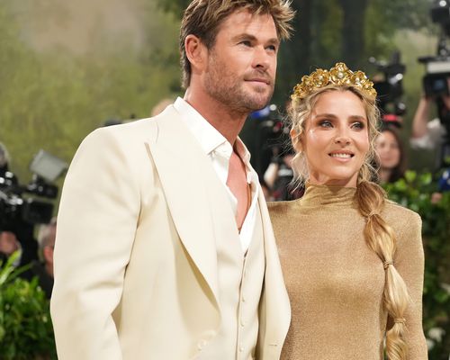 Chis Hemsworth in Cream Tuxedo With Elsa Pataky in Gold Gown and Crown on Met Gala 2024 Red Carpet