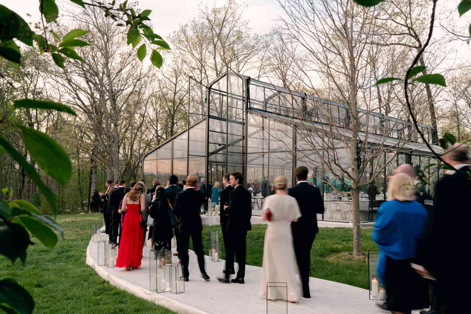 Guests Walking Into Reception Inside Glass Tent