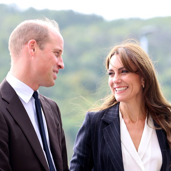 prince william in gray suit and kate middleton in blue striped blazer with white shirt