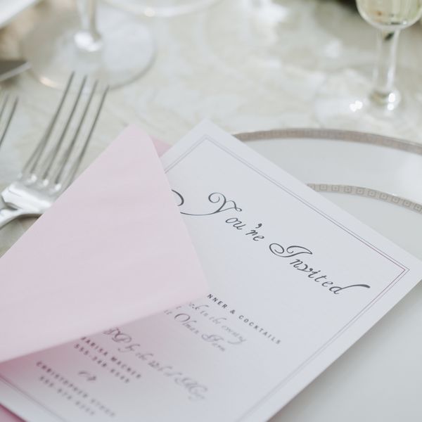 Wedding Invitation on Wedding Reception Table