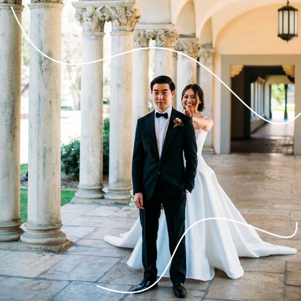 Bride tapping on groom's shoulder during first look