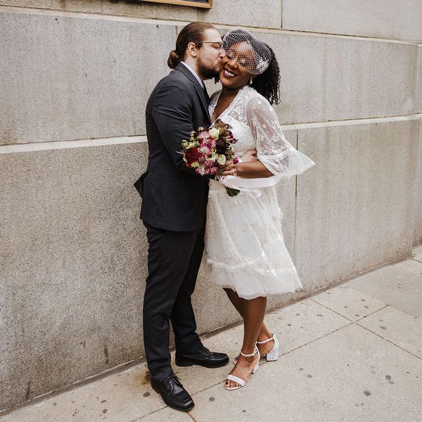 Bride and Groom Kissing Outside Chicago City Hall