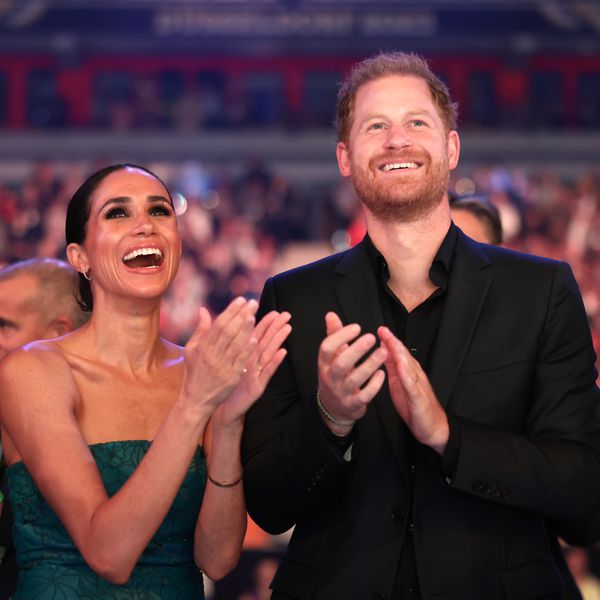 Prince Harry and Meghan Markle clapping 