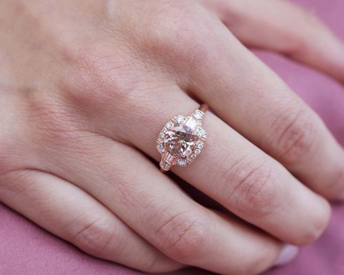 Morganite engagement ring on female hand