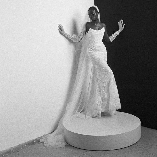 model wearing a strapless wedding dress