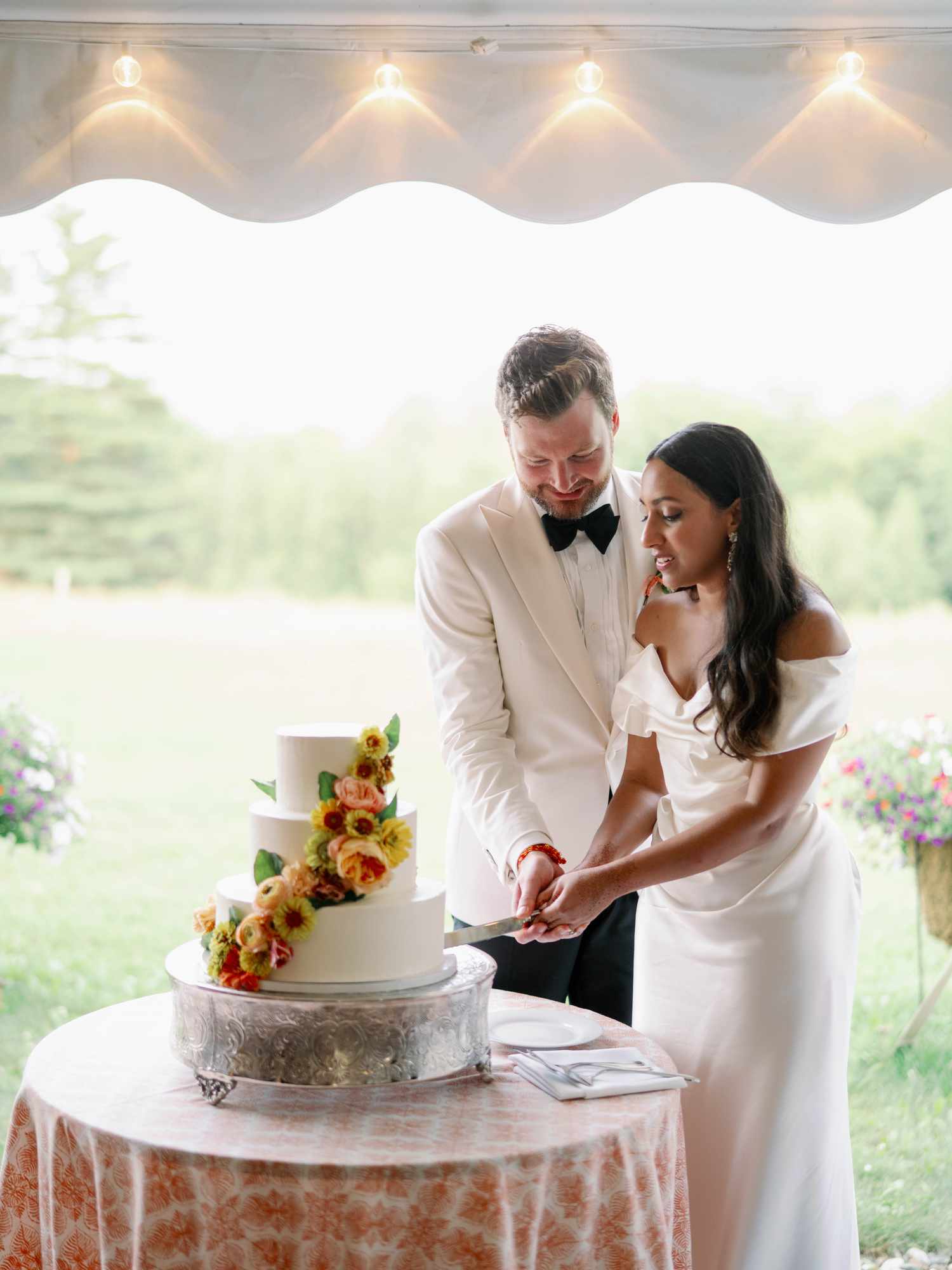 Wedding Couple Cutting Cake 