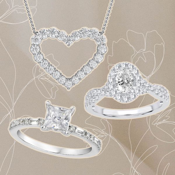 Fred Meyer Jewelers necklace and engagement rings on a beige background