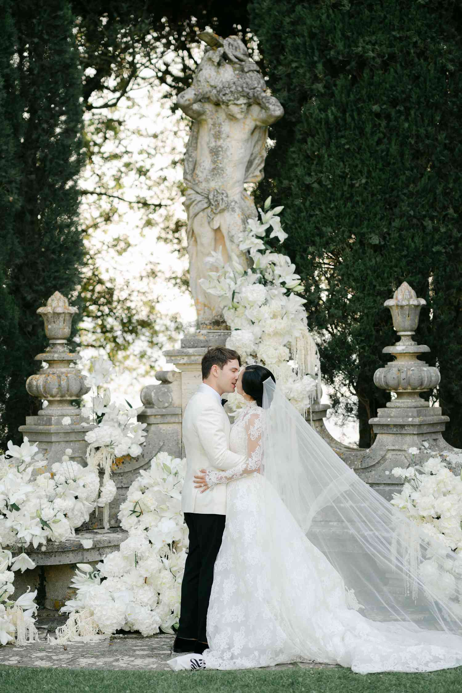 Wedding Couple Kissing at Altar