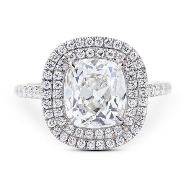 vintage-style cushion-cut diamond with high crown angles set in platinum