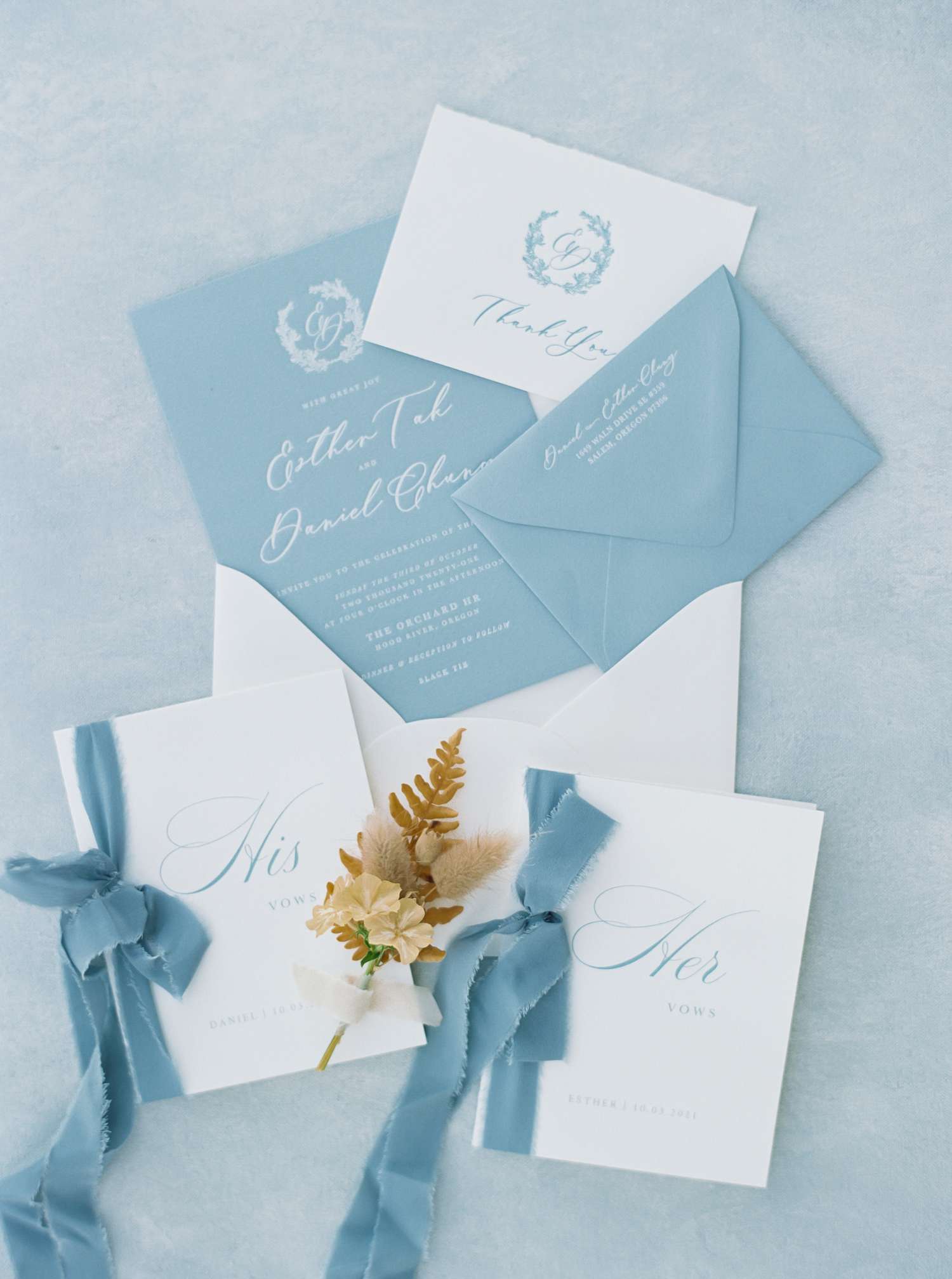 Esther and Daniel's blue and white invitations