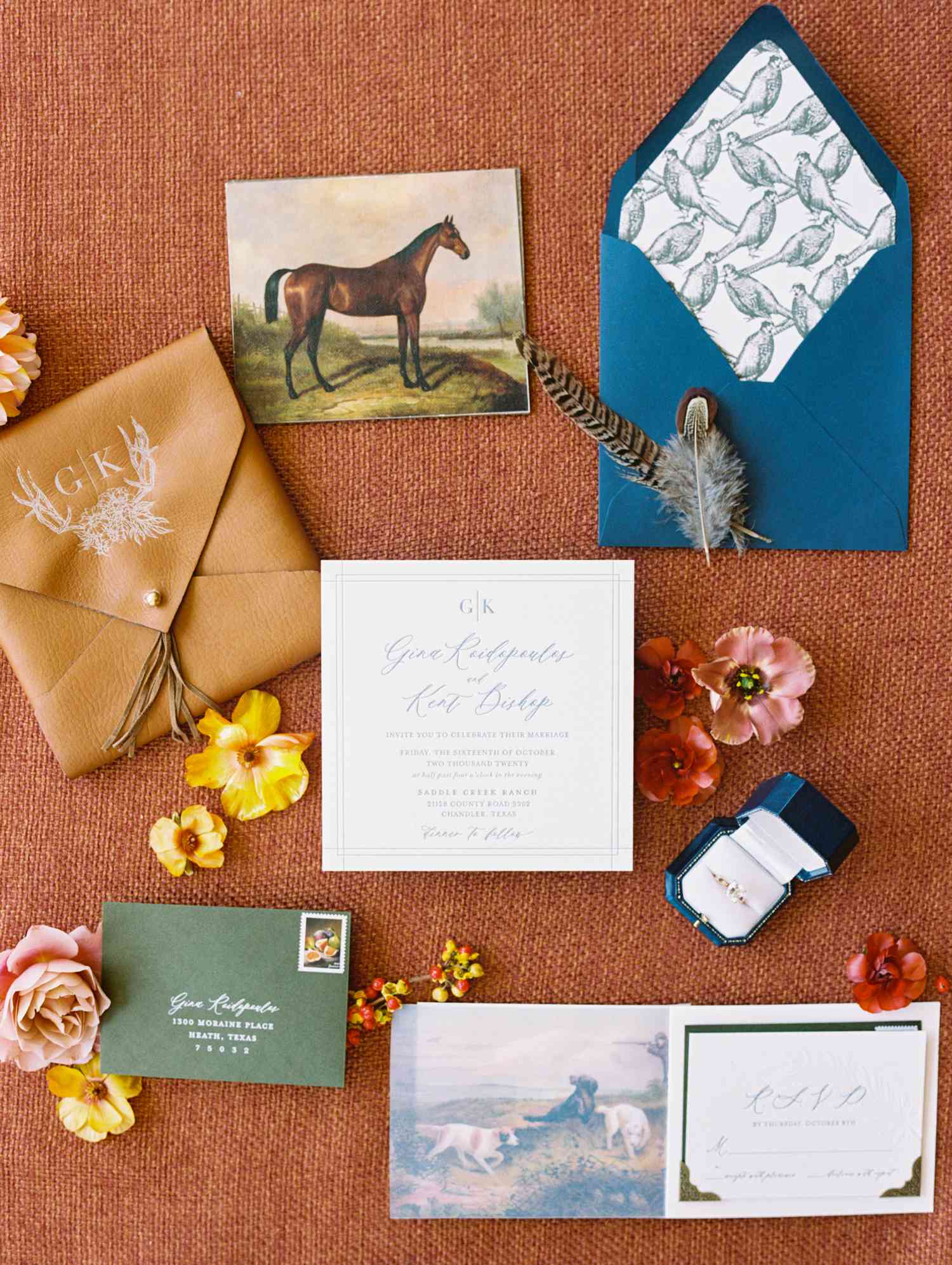 A western-themed boxed wedding invitation suite.