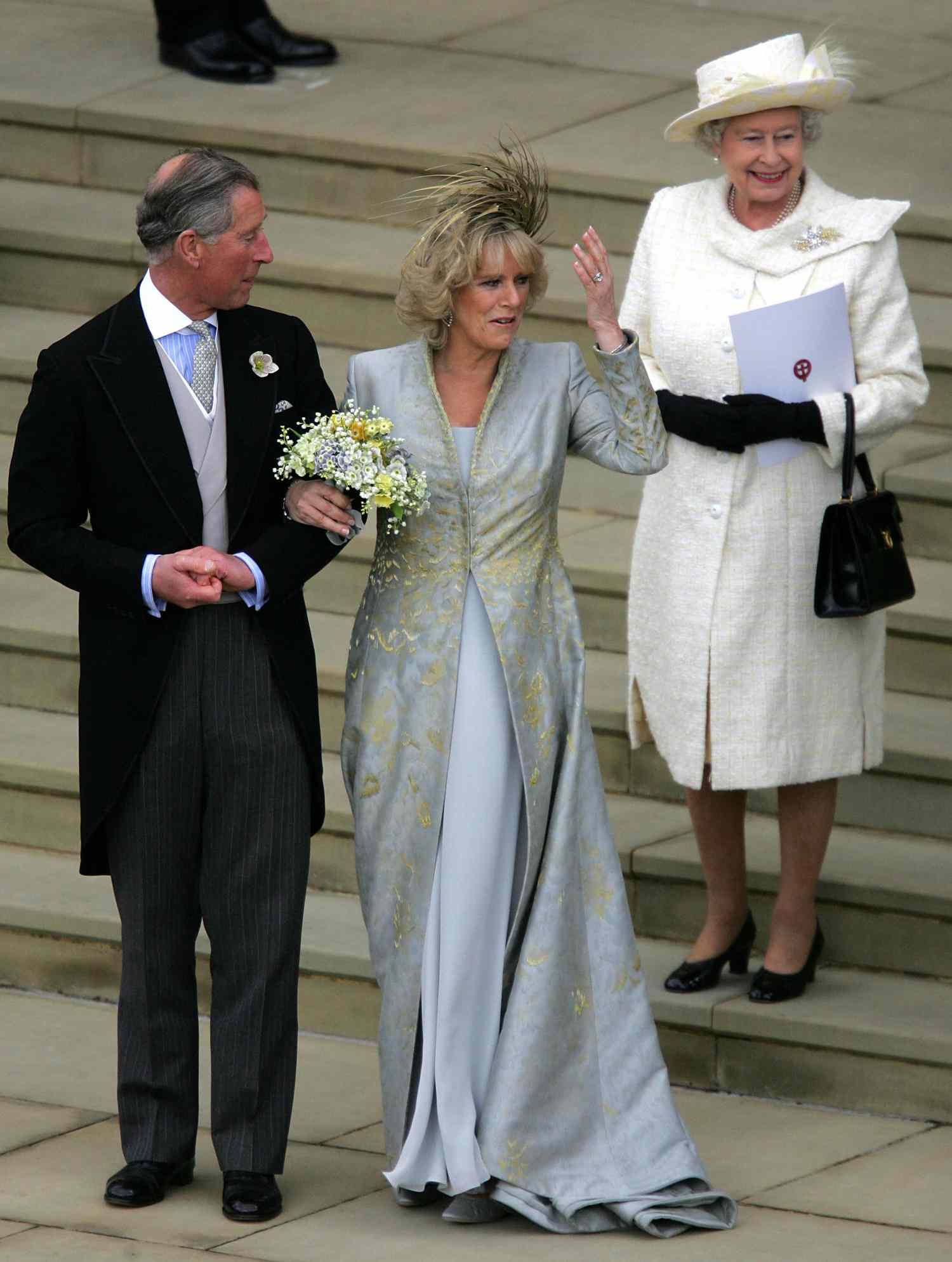 King Charles and Queen Camilla Linking Arms With Queen Elizabeth on the Steps