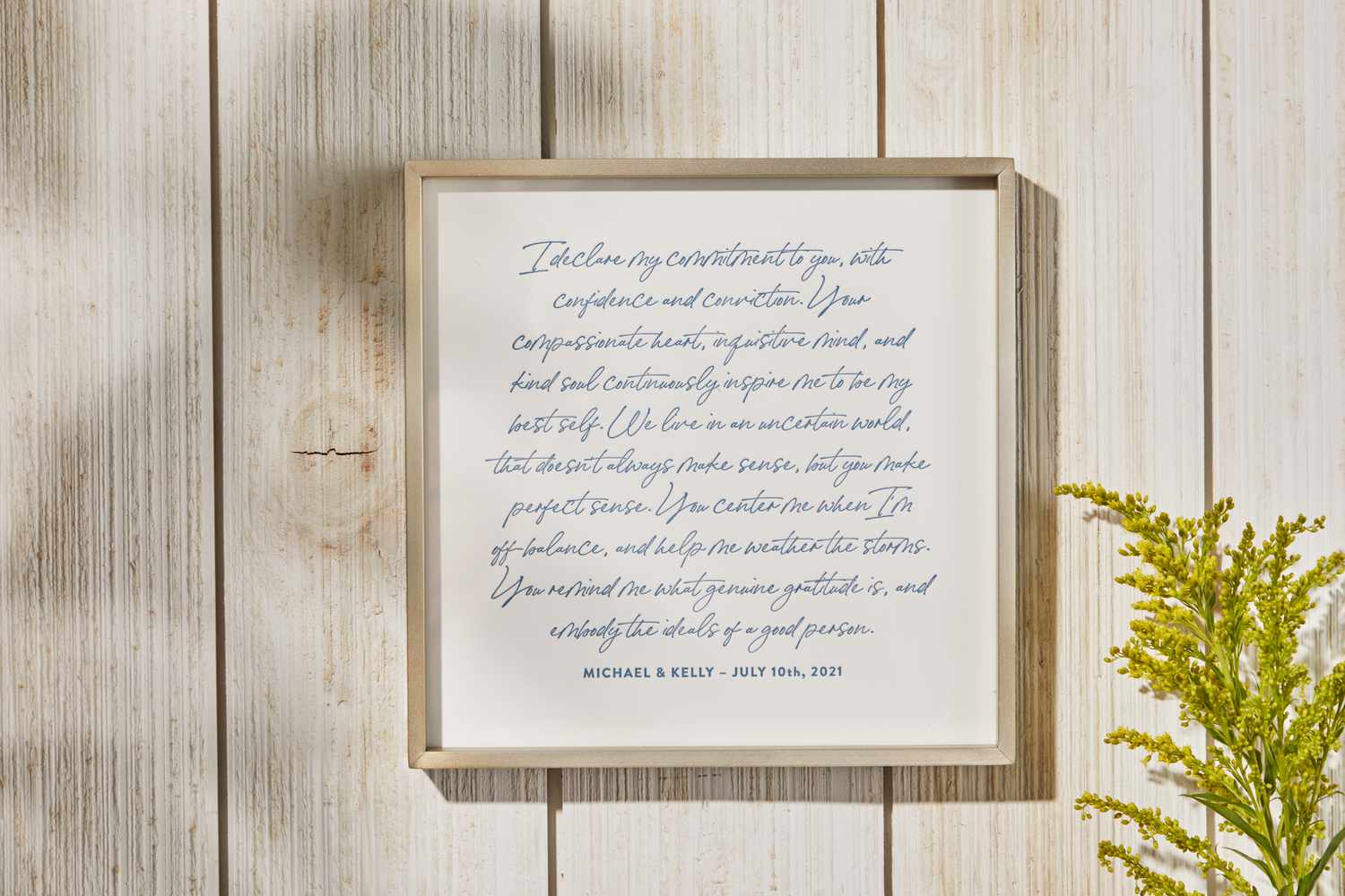 The Minted Letterpress Vows Art Print hanging on a wall.