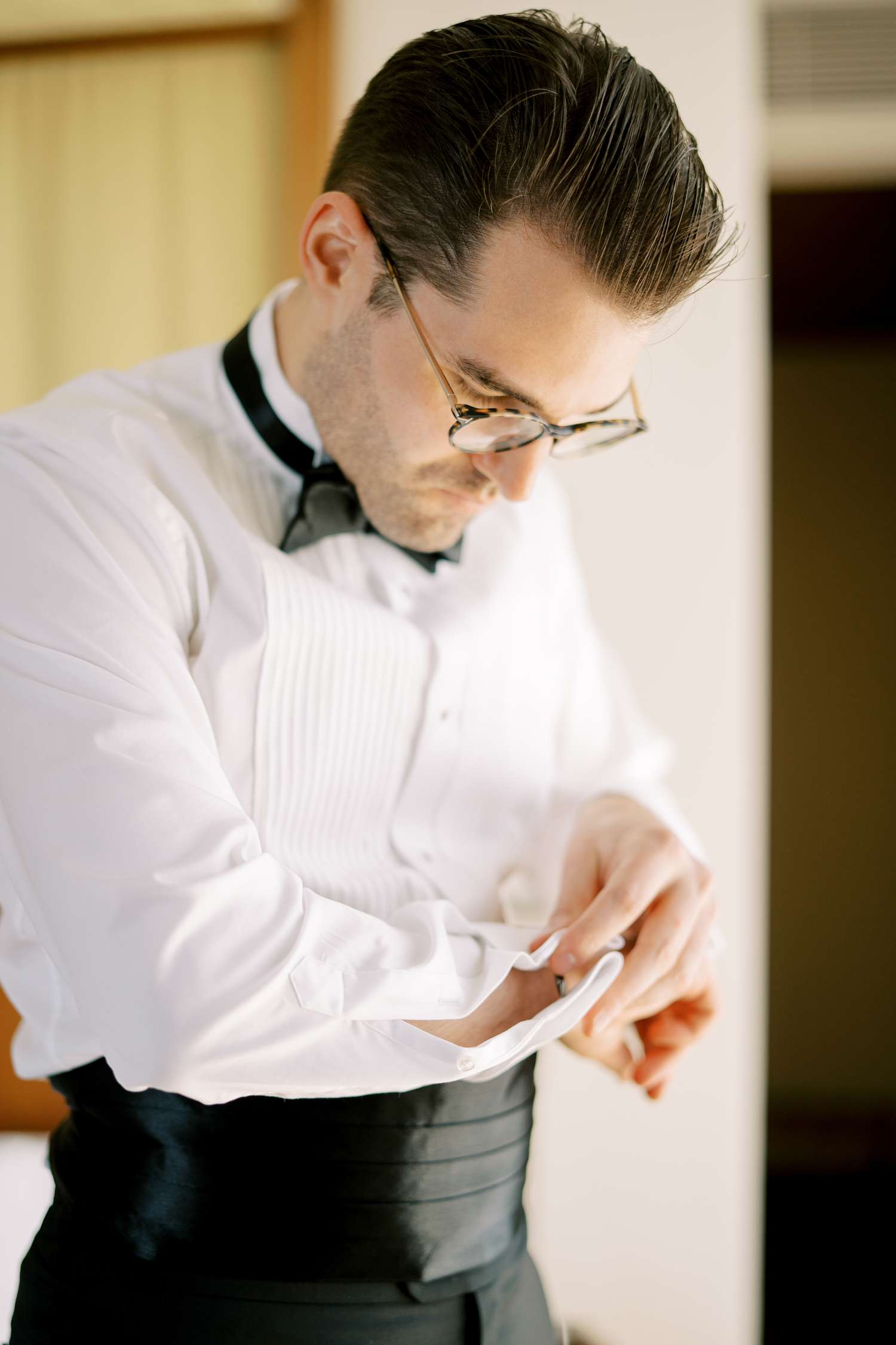 groom gets ready for wedding