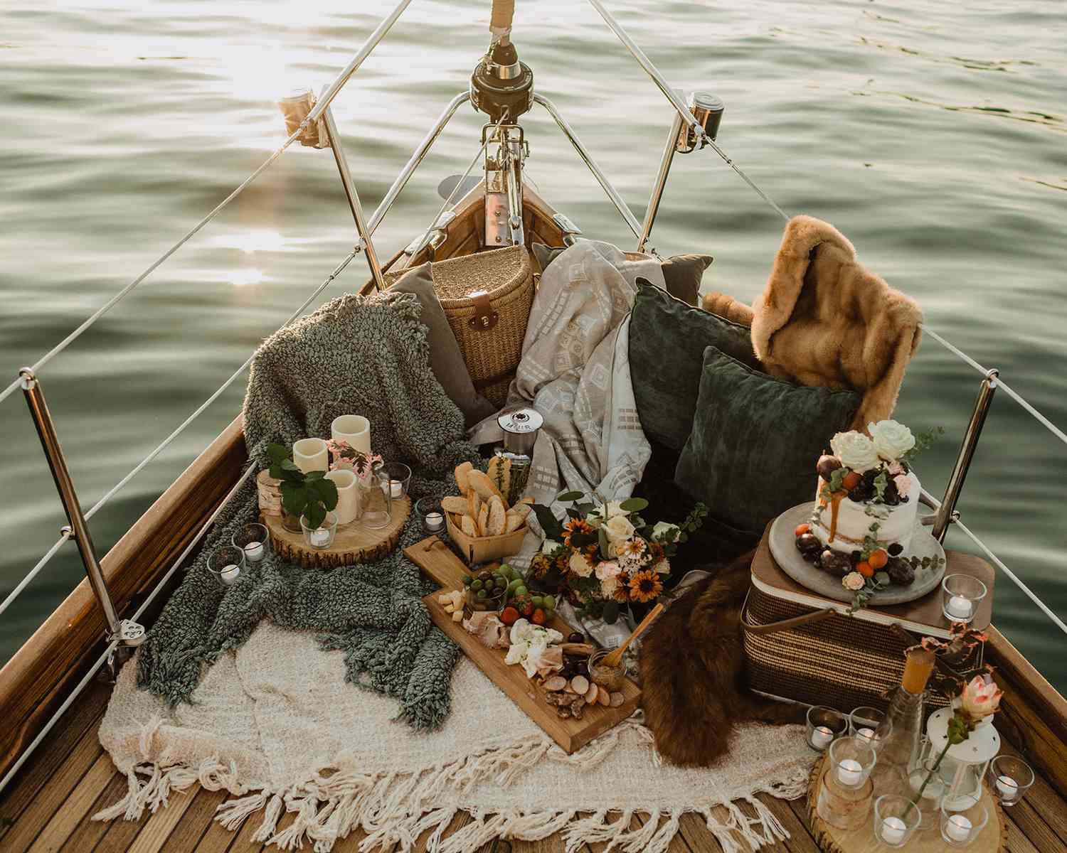 A picnic spread on the bow of a boat