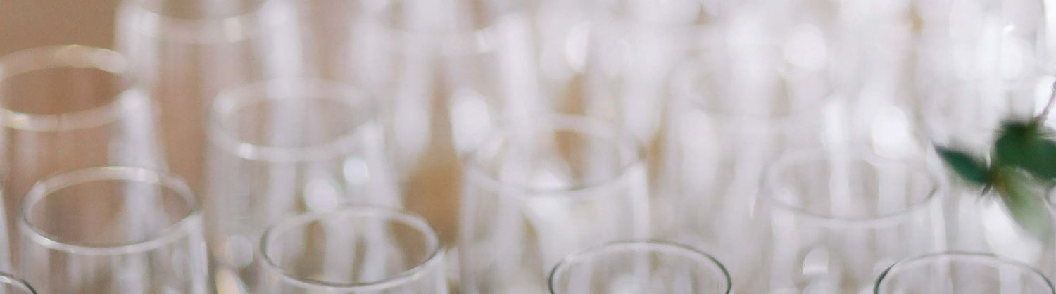 the tops of a group of champagne glasses