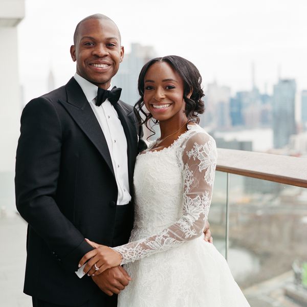 Portrait of Wedding Couple on Balcony