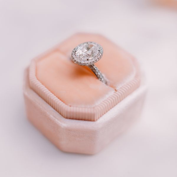 solitaire engagement ring with diamond with a diamond halo