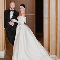 Derek Hough in Black Tuxedo and Hayley Erbert in Off-the-Shoulder Monique Lhuillier Wedding Dress