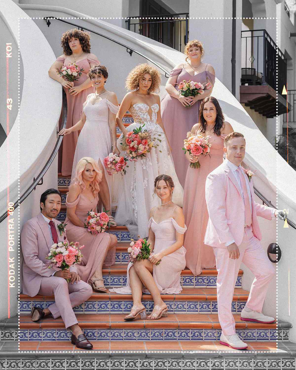 Bride with bridesmaids and bridesmen on staircase