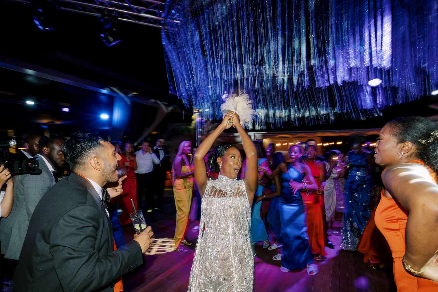 bride tosses bouquet